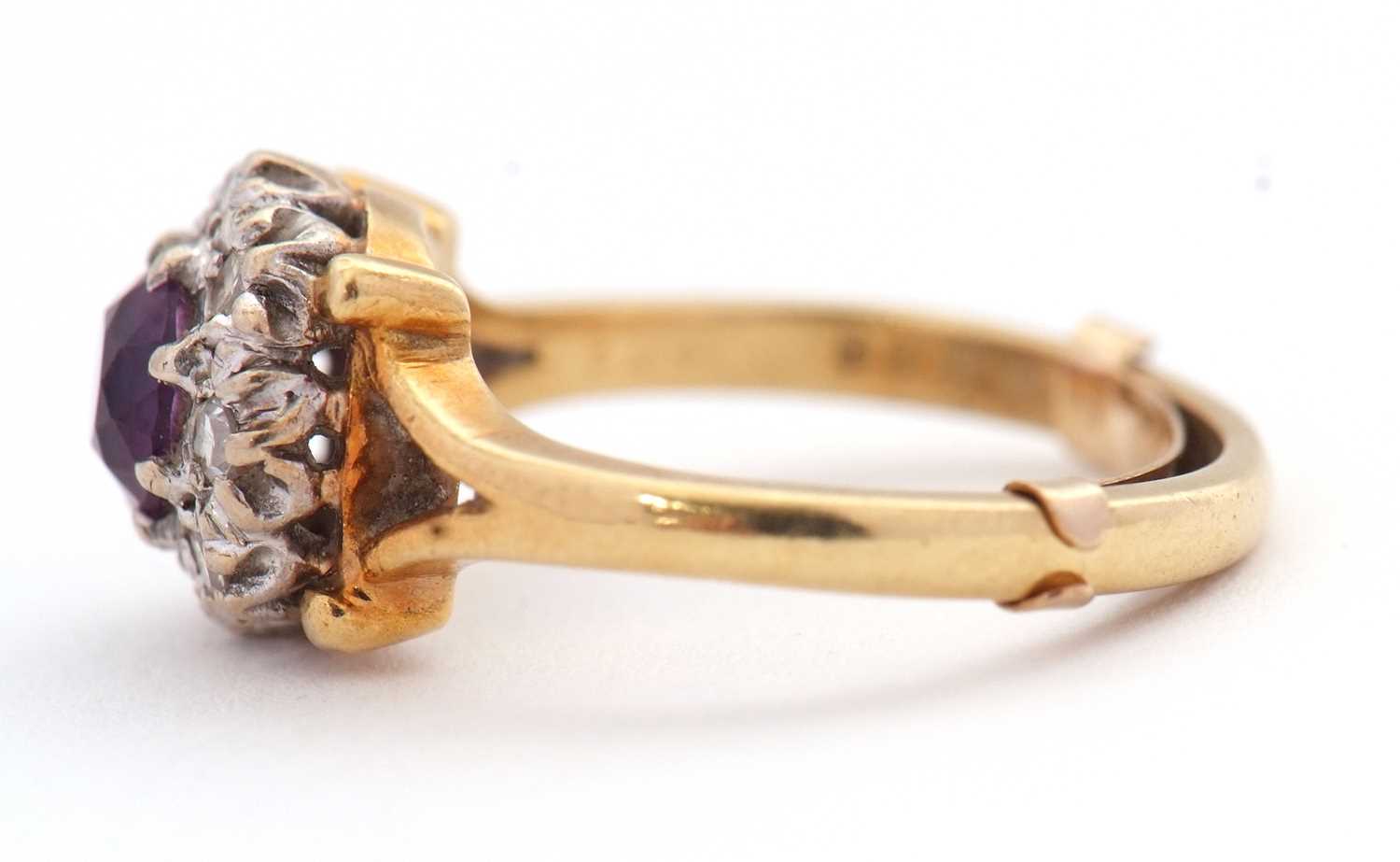 An 18ct amethyst and diamond ring, the central round amethyst surrounded by single cut diamonds, - Image 2 of 7