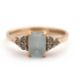 A 9ct aquamarine ring, set with an emerald cut aquamarine and three small round aquamarines to - Image 2 of 8