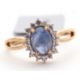 A 9ct sapphire and white zircon ring, the central oval sapphire cabochone, surrounded by small round - Image 4 of 6