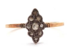 A diamond ring, the marquise shape plaque set with polki style diamonds set in unmarked white