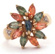 A 9ct multi gemset ring, the flower style cluster ring set with orange and green marquise gemstones,