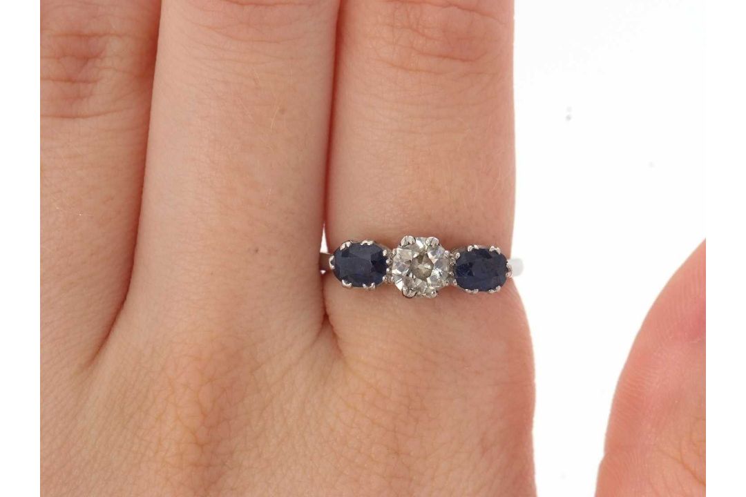 A three stone sapphire and diamond ring, the central old mine cut diamond, estimated approx. 0. - Image 6 of 9