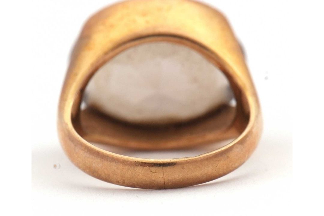 A 9ct smokey quartz ring, the oval smokey quartz in a horizontal tension settting, with split - Image 7 of 8