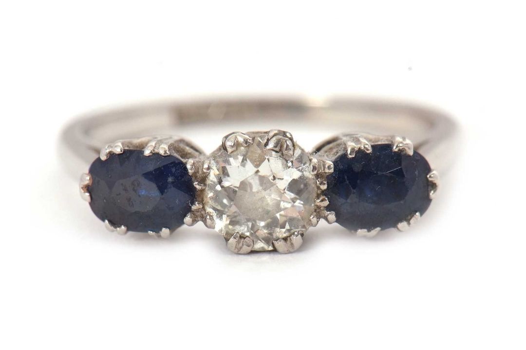 A three stone sapphire and diamond ring, the central old mine cut diamond, estimated approx. 0. - Image 4 of 9