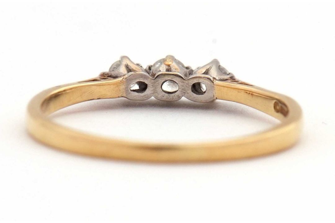 An 18ct three stone diamond ring, the three round brilliant cut diamonds, total estimated approx. - Image 7 of 7