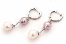 A pair of 14K cultured pearl earrings, with half white stone set hoops, with a white and a pink