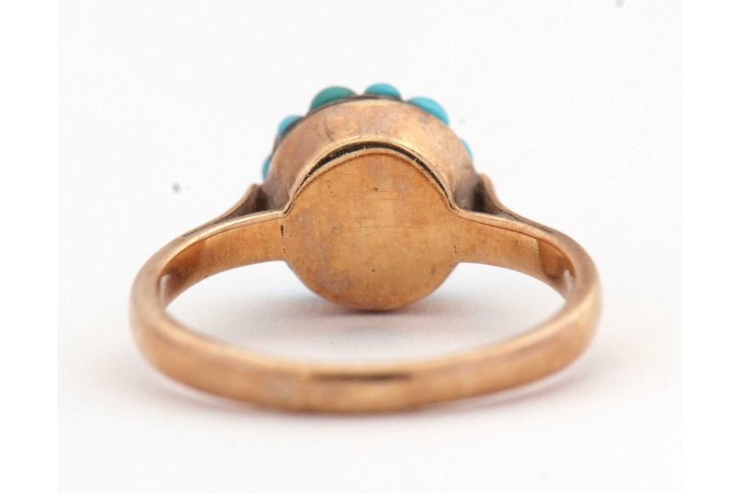 A turquoise cluster ring, the cluster composed of small turquoise cabochons, in raised mount with - Image 5 of 6