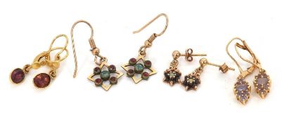 Four pairs of gemset earrings: to include a pair of tanzanite cluster earrings with hooks stamped 9K