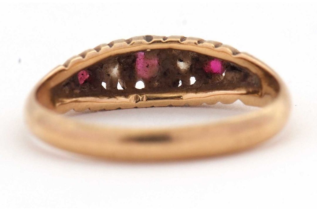 An early 20th century 18ct ruby and diamond ring, the alternating round rubies and old mine cut - Image 6 of 6