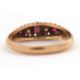 An early 20th century 18ct ruby and diamond ring, the alternating round rubies and old mine cut - Image 6 of 6