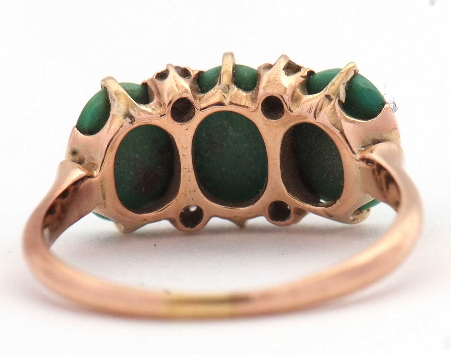 A turquoise and diamond ring, the three oval turquoise cabochons with diamond highlights, all set in - Image 4 of 5
