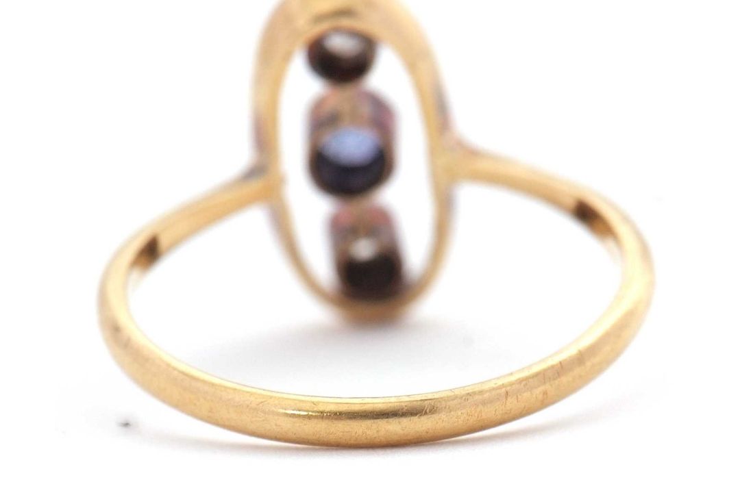 A sapphire and diamond ring, the oval frame with two collet mounted old mine cut diamonds and a - Image 4 of 7