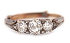 A three stone diamond ring, the three old mine cut diamonds, total estimated approx. 1.0cts, all set