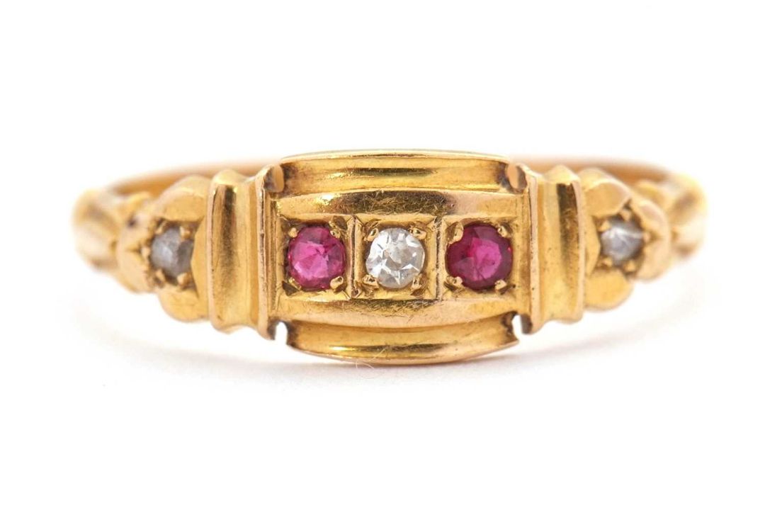 An Edwardian 18ct ruby and diamond ring, set with a central round diamond and a round ruby to either - Image 7 of 7