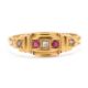 An Edwardian 18ct ruby and diamond ring, set with a central round diamond and a round ruby to either - Image 7 of 7