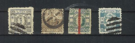 Japan 1875, MiNr. 28-30 + 32, gestempelt.