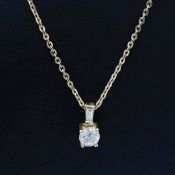 AN 18CT GOLD DIAMOND SOLITAIRE PENDANT NECKLACE.