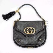 GUCCI BRITT SILVER GUCCISSIMA LEATHER TASSEL BAG.