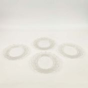 A SET OF FOUR LALIQUE GLASS PLATES.