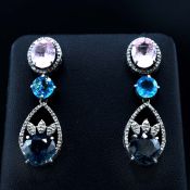 A PAIR OF SILVER PENDANT EARRINGS.