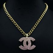 CHANEL PINK CC NECKLACE.