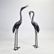 A PAIR OF CONTEMPORARY BRONZE SCULPTURES OF CRANES.