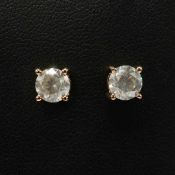 A PAIR OF 18CT GOLD DIAMOND STUD EARRINGS.