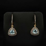 A PAIR OF AQUAMARINE EARRINGS.