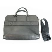 LOUIS VUITTON TAIGA NEO LEATHER TRAVEL BAG.