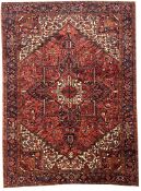 ANTIQUE PERSIAN HERIZ CARPET.
