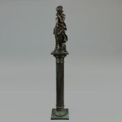 MATHURIN MOREAU (1822–1912). In the manner of. A RESIN BRONZED STATUE OF A LADY ON COLUMN. (2).