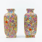 PAIR OF CHINESE PINK FLORAL CERAMIC VASES.
