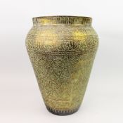 A 19TH CENTURY QAJAR DYNASTY PERSIAN BRASS VASE.