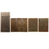 A COLLECTION OF ANTIQUE CHINESE CARVED WINDOWS. (7).