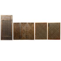 A COLLECTION OF ANTIQUE CHINESE CARVED WINDOWS. (7).