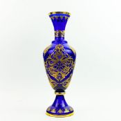 AN 'ART' CZECH REPUBLIC BLUE AND 22CT GILT DECORATED PERSIAN STYLE VASE.