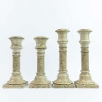 STONE CANDLE STICKS, TWO PAIRS.