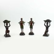 FRANZ BERGMANN. In the manner of. A PAIR OF CANDLESTICKS AND A PAIR OF BLACKAMORE DUMB WAITERS. (4).