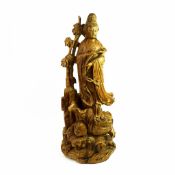 A CHINESE CARVED WOOD FIGURE OF GUANYIN.