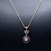 AN 8CT RUBY AND DIAMOND PENDANT NECKLACE.