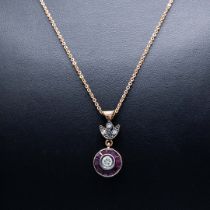 AN 8CT RUBY AND DIAMOND PENDANT NECKLACE.