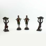 FRANZ BERGMANN. In the manner of. A PAIR OF CANDLESTICKS AND A PAIR OF BLACKAMORE DUMB WAITERS. (4).