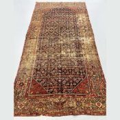 ANTIQUE DISTRESSED PERSIAN MAHAL CARPET.