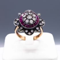 AN 8CT RUBY AND DIAMOND CLUSTER RING.