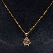 AN 18CT YELLOW GOLD DIAMOND SOLITAIRE PENDANT NECKLACE.