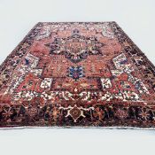 ANTIQUE PERSIAN HERIZ CARPET.