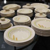 A CLARICE CLIFF 'WHEAT' PART DINNER SERVICE.