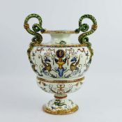 A GIEN FAIENCE TWIN HANDLED VASE.