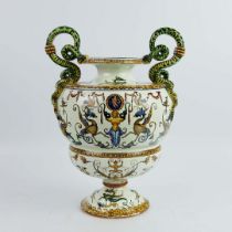A GIEN FAIENCE TWIN HANDLED VASE.