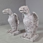 SCULPTURAL FAUX STONE EAGLES, A PAIR.